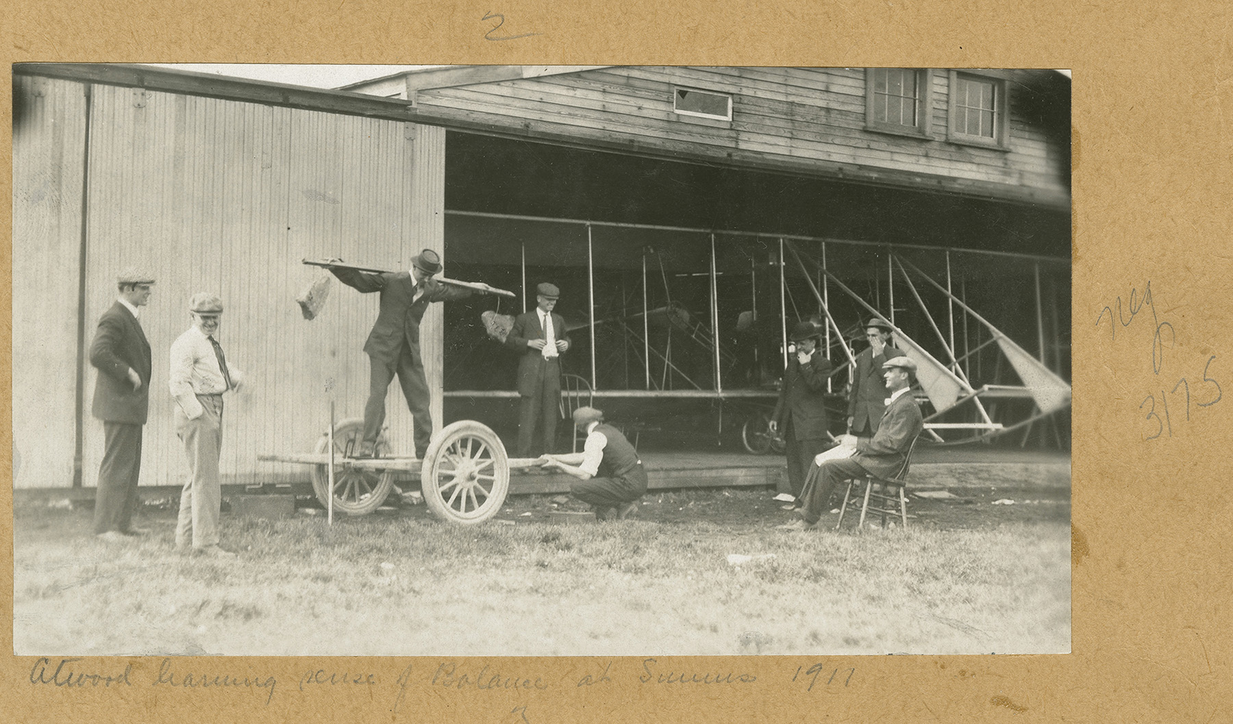 Atwood learning sense of balance at Simms (Station), 1911 (from MS-216)