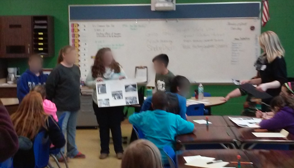 McKinley students presenting their poster, Jan. 29, 2015