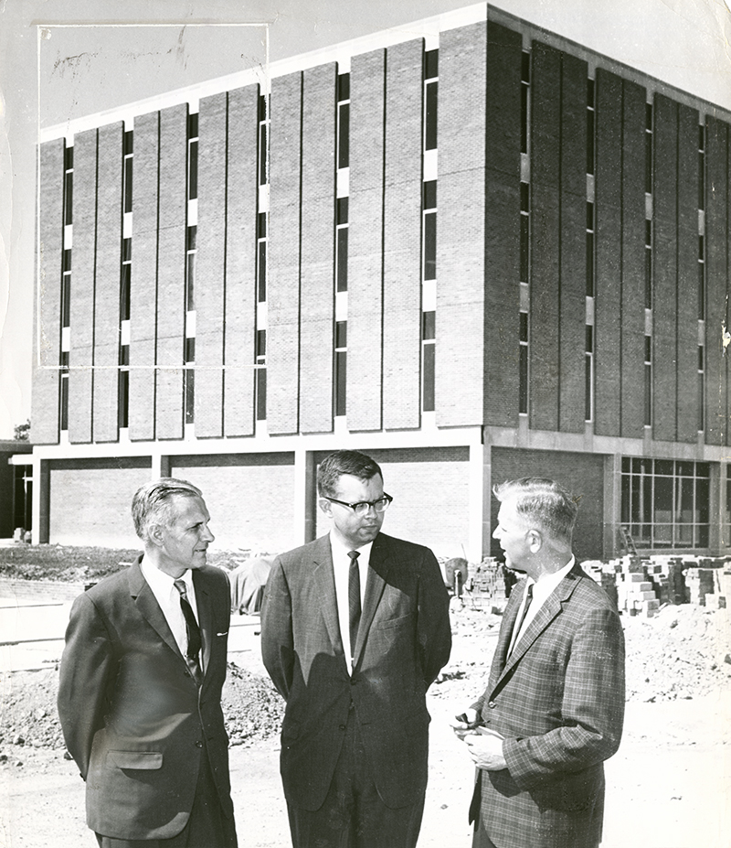 Original DDN caption (Sept. 13, 1964): "Three officials talk future plans. They are Howard Bales, assistant director of the college of science and engineering; Warren H. Abraham, assistant dean of academic centers of Miami U., and C. DeWitt Hardy, director of admissions."